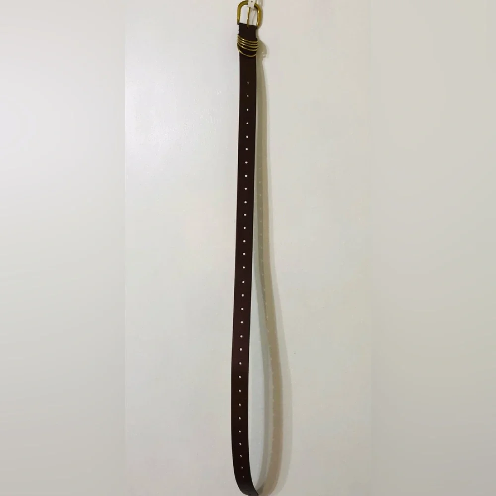 Women’s belt five loop brown. Size S/M. Materials manmade. Size 38”L X 1-1/2”W